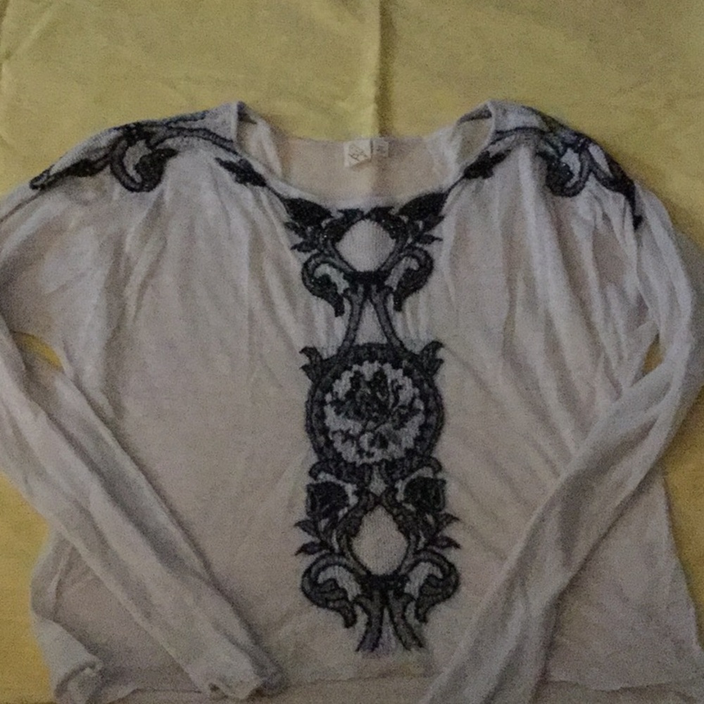 Anthropologie brand Appliqué